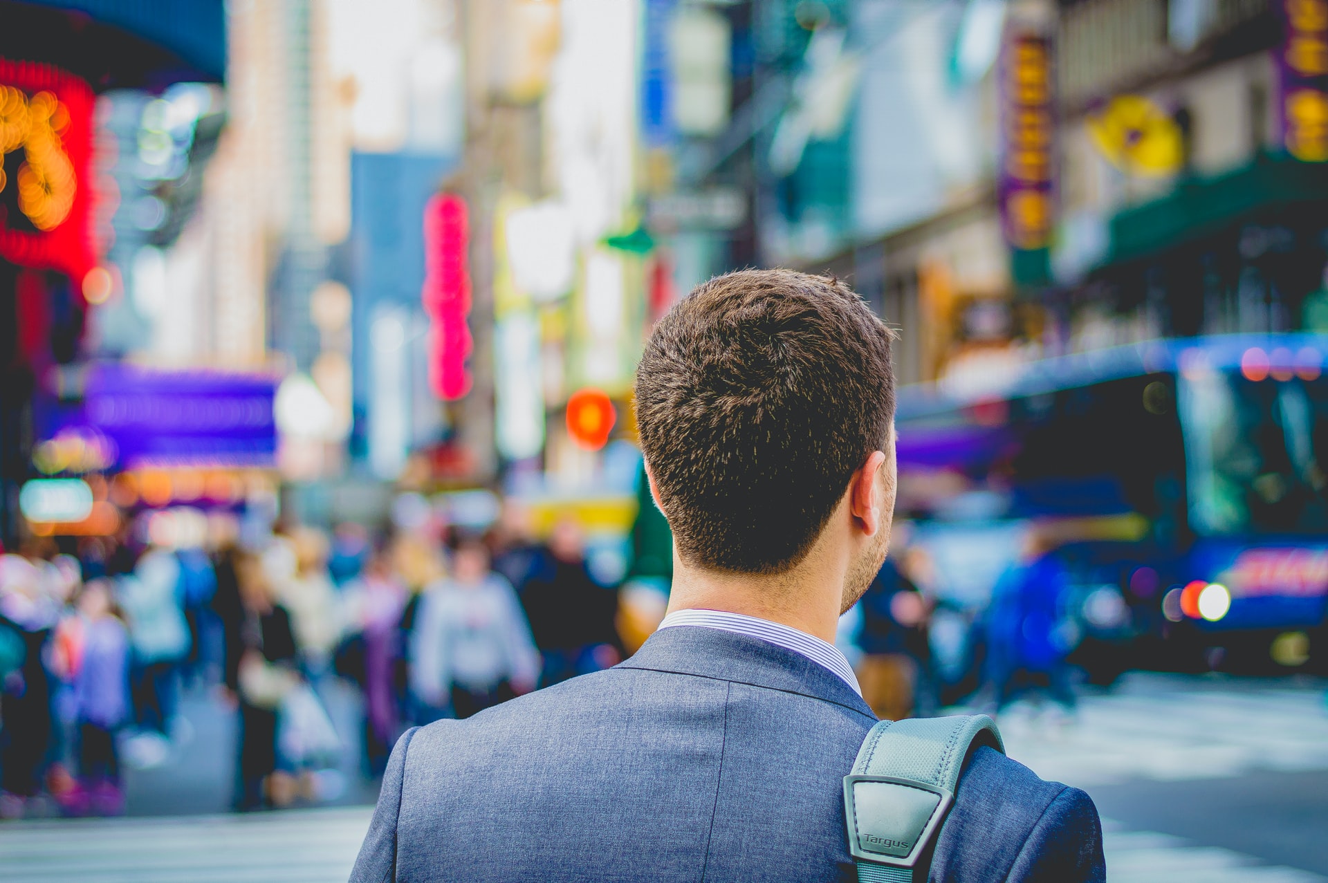 A person on his way to job wearing an office bag